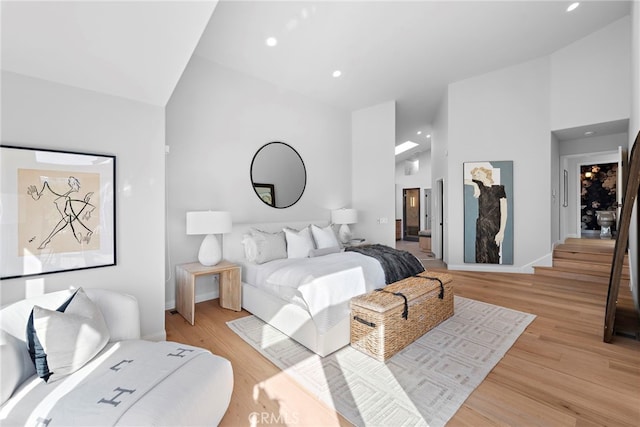 2335 Hillview Dr, Laguna Beach, CA 92651 - bedroom with light wood-style flooring, recessed lighting, and high vaulted ceiling