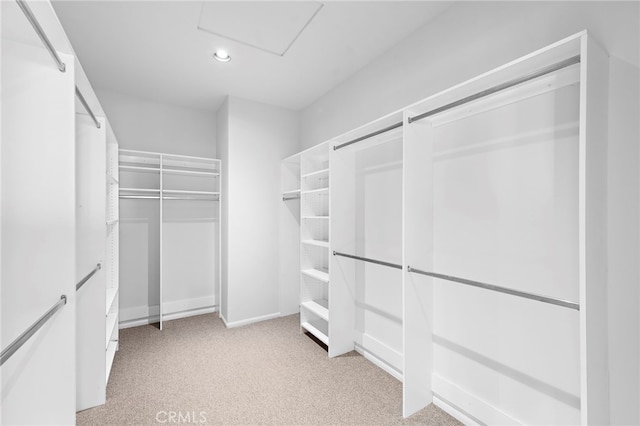 2335 Hillview Dr, Laguna Beach, CA 92651 - walk in closet featuring light carpet and attic access