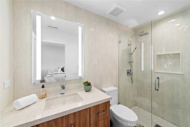 2335 Hillview Dr, Laguna Beach, CA 92651 - ensuite bathroom with tile walls, vanity, a stall shower, and recessed lighting
