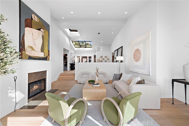 2335 Hillview Dr, Laguna Beach, CA 92651 - living room featuring light wood-style flooring, a fireplace with flush hearth, and recessed lighting