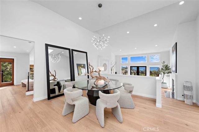 2335 Hillview Dr, Laguna Beach, CA 92651 - dining room with light wood-type flooring, healthy amount of natural light, recessed lighting, and high vaulted ceiling