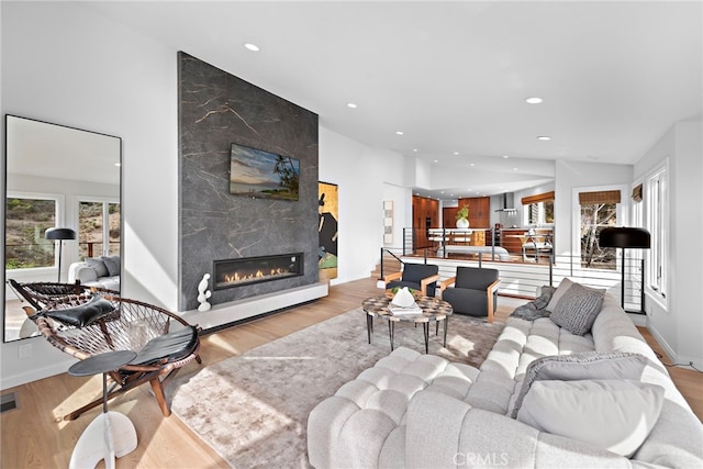 2335 Hillview Dr, Laguna Beach, CA 92651 - living room with wood finished floors, recessed lighting, and a high end fireplace