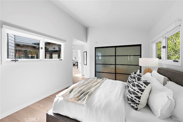 2335 Hillview Dr, Laguna Beach, CA 92651 - bedroom featuring wood finished floors and lofted ceiling
