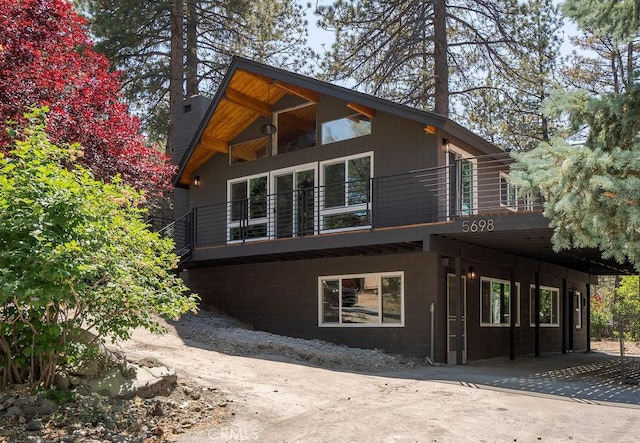 view of home's exterior featuring a balcony