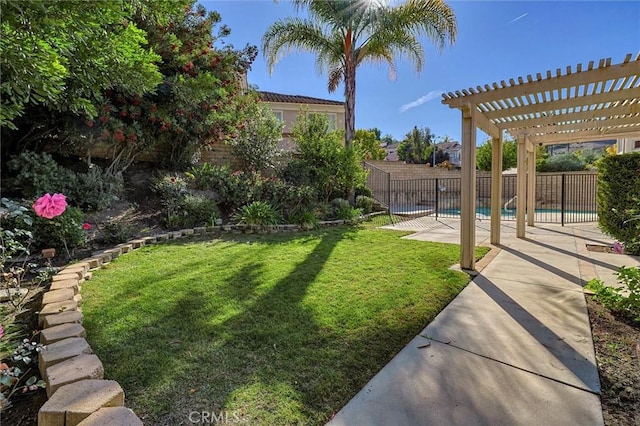 view of yard with a fenced in pool, a patio, and a pergola