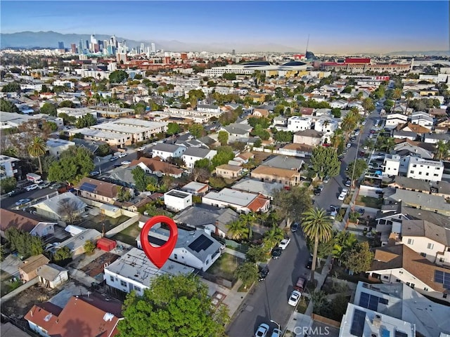 birds eye view of property with a city view