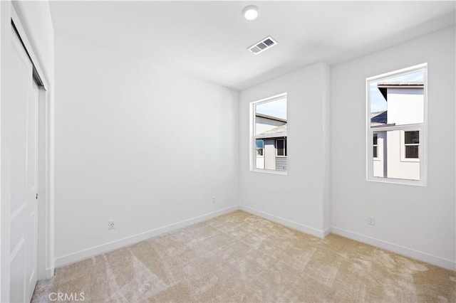 view of carpeted spare room