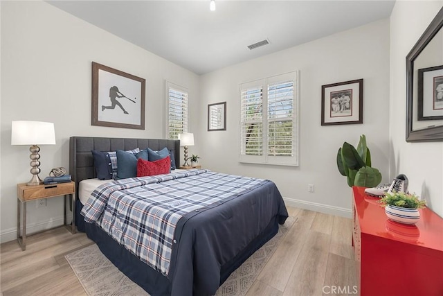 bedroom featuring light hardwood / wood-style floors