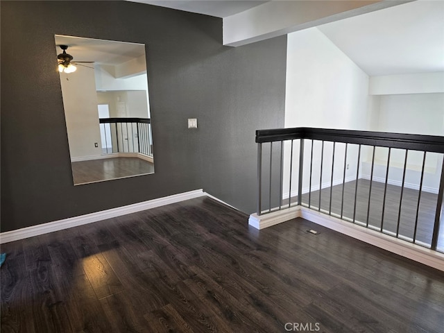 corridor featuring dark wood-type flooring