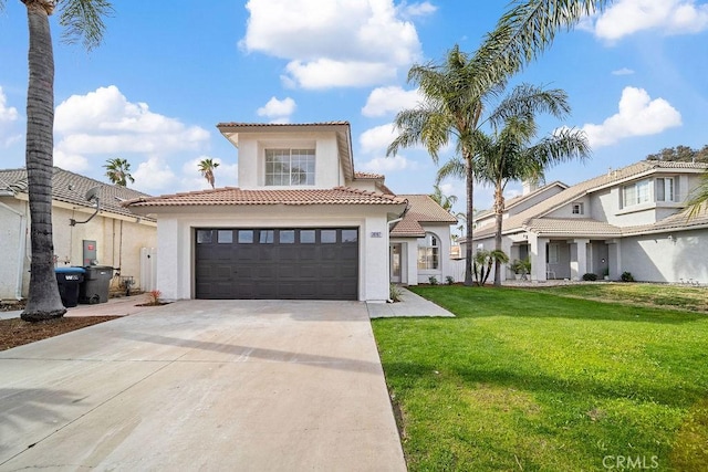 view of front of house with a garage and a front yard