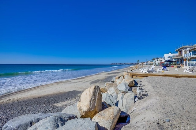 water view featuring a beach view