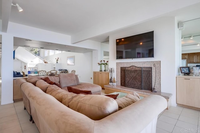 living room with light tile patterned floors