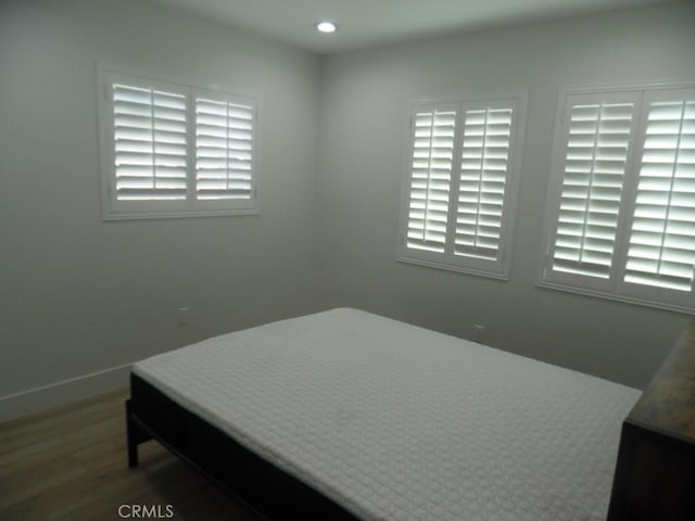 bedroom featuring hardwood / wood-style floors