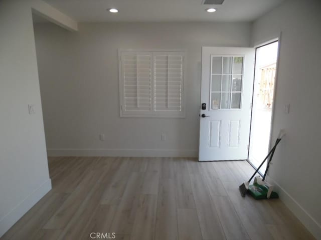 foyer entrance featuring light hardwood / wood-style flooring