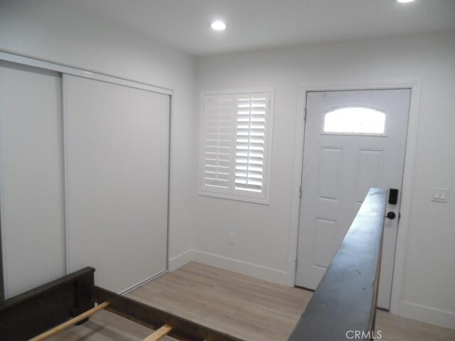 entrance foyer with hardwood / wood-style floors