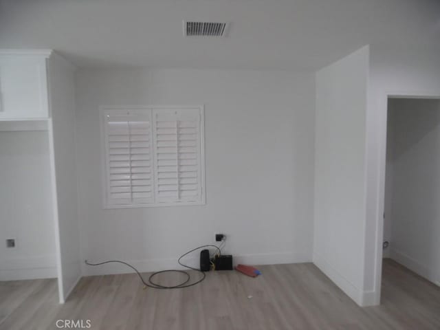 unfurnished bedroom with light hardwood / wood-style floors