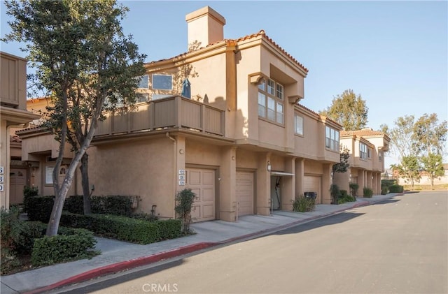 view of building exterior featuring a garage