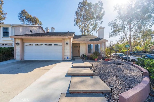 view of front of home featuring a garage