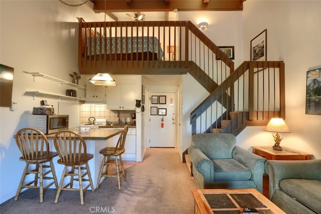 living room with light colored carpet