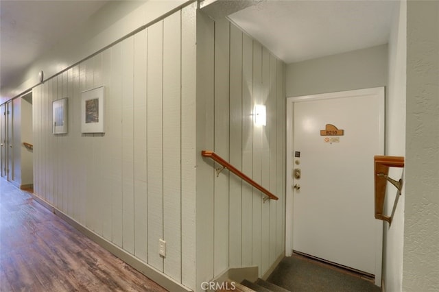 staircase featuring hardwood / wood-style flooring