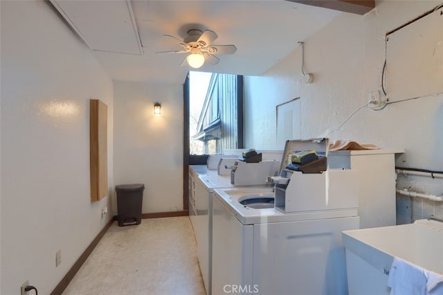 washroom featuring ceiling fan, sink, and washer and clothes dryer