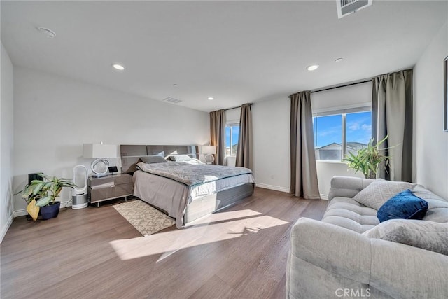 bedroom with light wood-type flooring