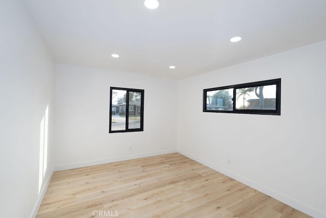 empty room with light wood-type flooring