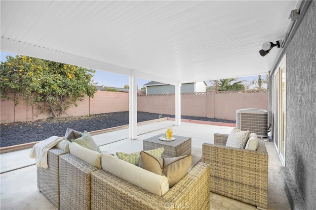 view of patio with an outdoor living space and central air condition unit