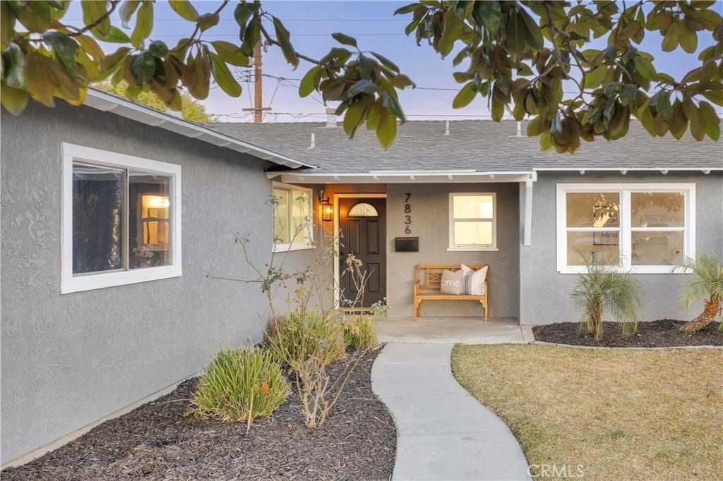 entrance to property with a patio area