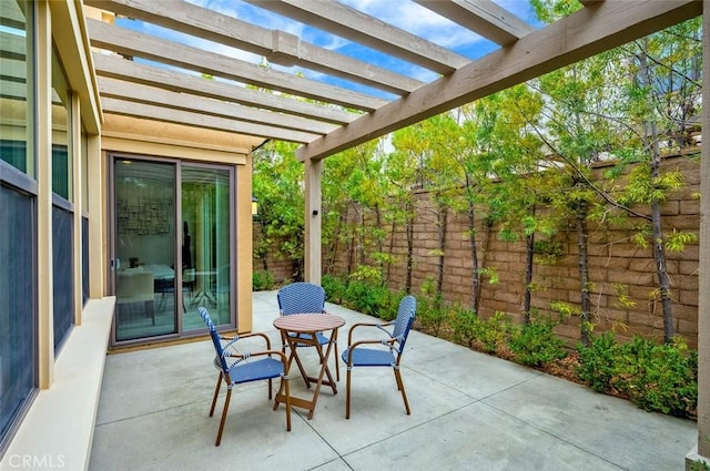 view of patio featuring a pergola