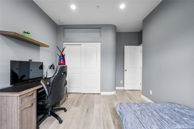 bedroom with light hardwood / wood-style floors