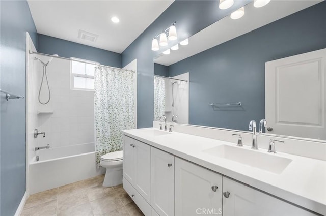 full bathroom featuring toilet, vanity, shower / bathtub combination with curtain, and tile patterned flooring