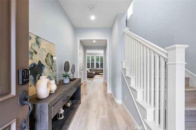 hall with light wood-type flooring