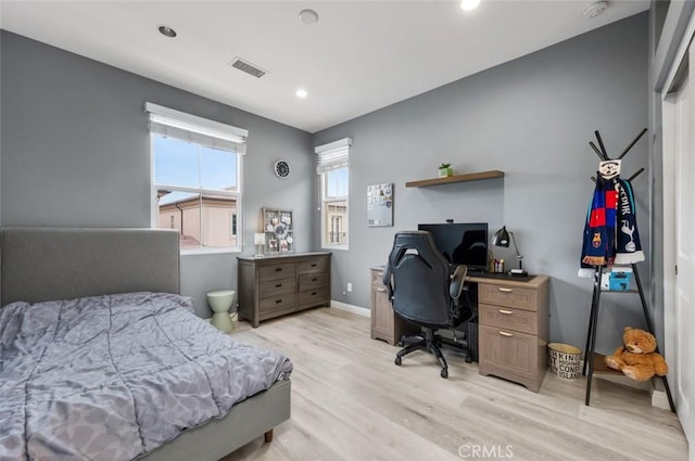 bedroom featuring light hardwood / wood-style floors