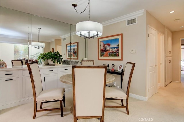 dining space featuring light carpet and ornamental molding