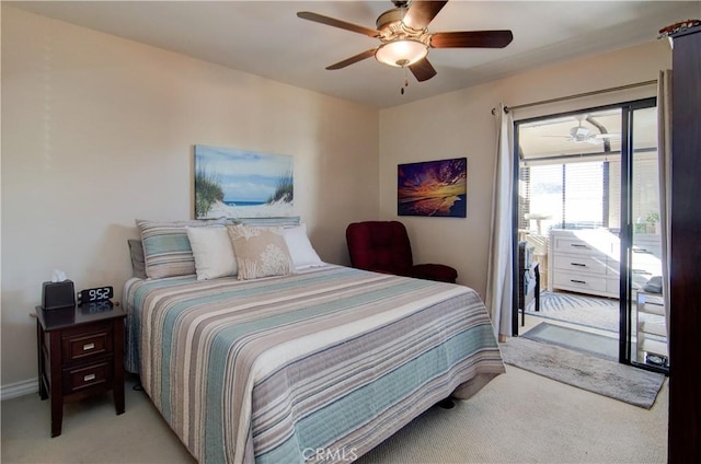 bedroom with light carpet, access to exterior, and ceiling fan