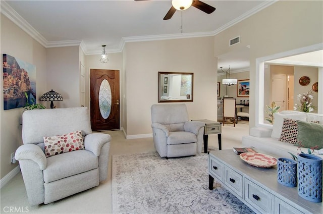 carpeted living room with crown molding and ceiling fan