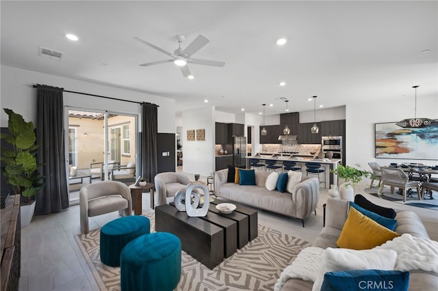 living room featuring ceiling fan