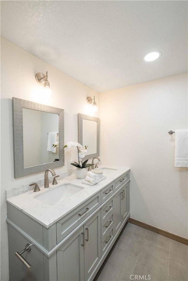 bathroom featuring vanity and tile patterned floors