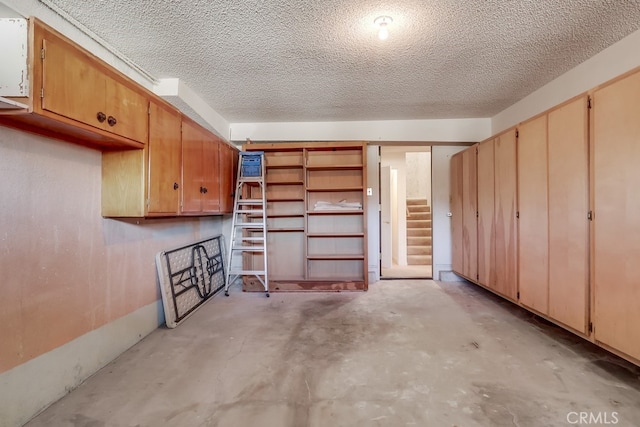 basement with a textured ceiling