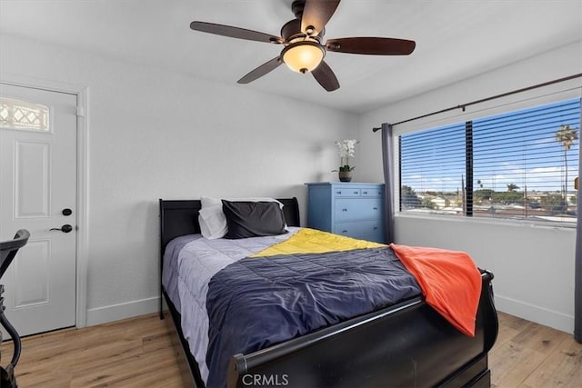 bedroom featuring ceiling fan and light hardwood / wood-style floors