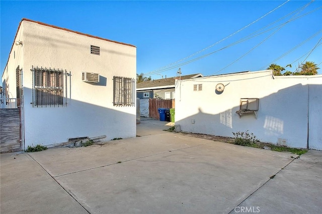 view of home's exterior featuring a patio