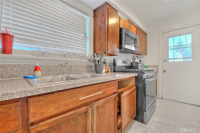 kitchen featuring sink and appliances with stainless steel finishes