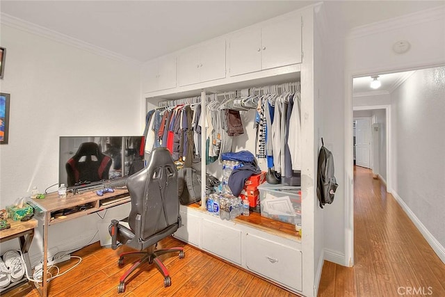 office area featuring crown molding and hardwood / wood-style flooring