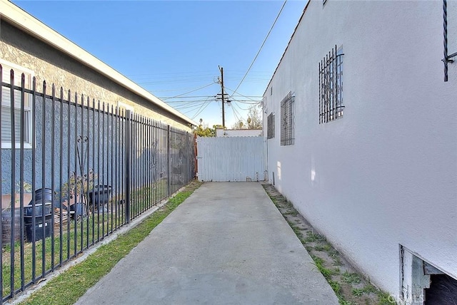 view of side of home featuring a patio