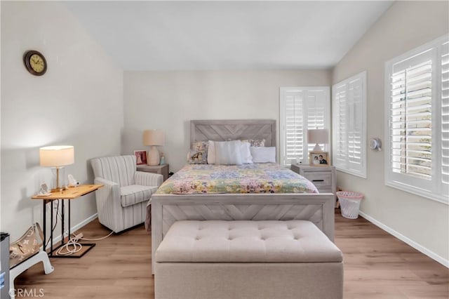 bedroom featuring light wood-type flooring