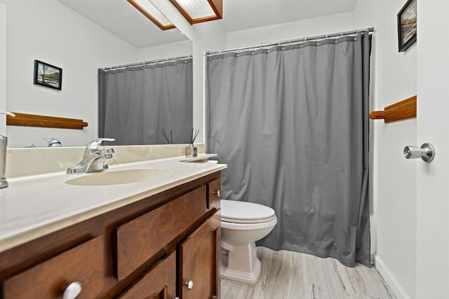 full bathroom with vanity, toilet, and shower / tub combo