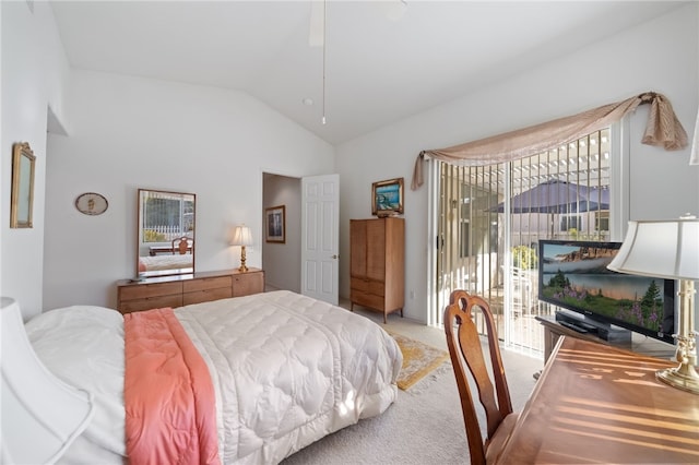 carpeted bedroom featuring vaulted ceiling, access to exterior, and ceiling fan