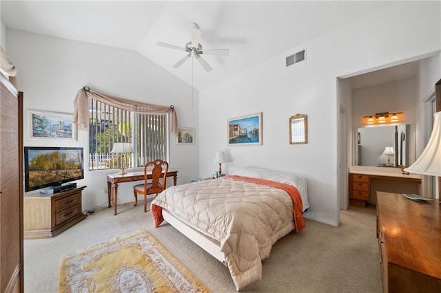 carpeted bedroom featuring vaulted ceiling and ceiling fan