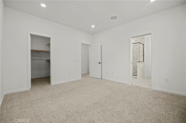 1090 Foothill Blvd, Claremont, CA 91711 - unfurnished bedroom featuring carpet, a spacious closet, recessed lighting, ensuite bathroom, and a closet